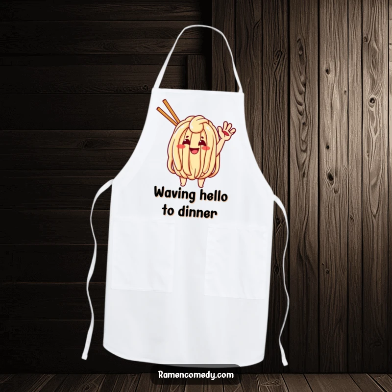 Funny apron showcasing a cheerful udon noodle character waving, a playful kitchen accessory for noodle fans.