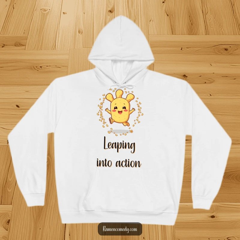 Funny tempura hoodie showcasing an excited tempura piece character leaping through sesame seeds, providing warmth and humor.