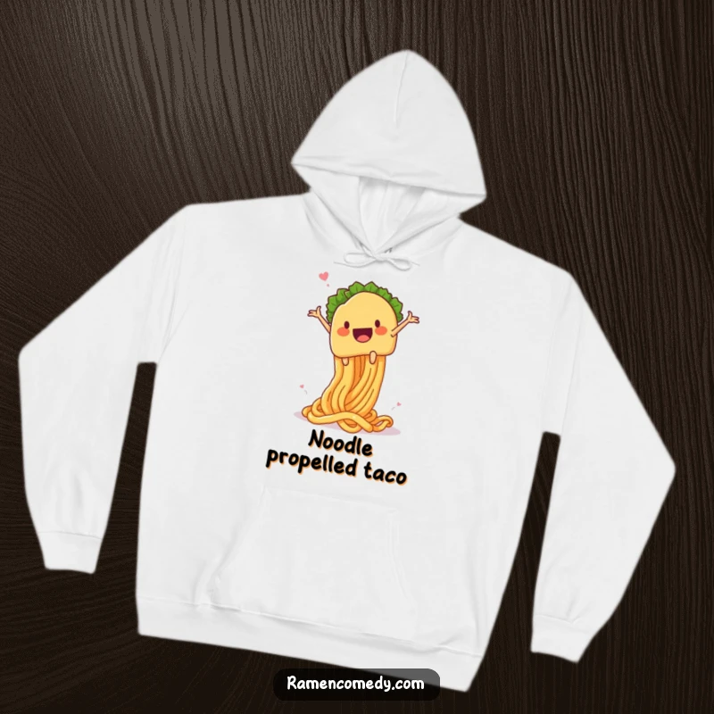 Funny taco noodle launch hoodie, a taco character gleefully launching from a giant springy noodle, offering warmth and culinary humor.