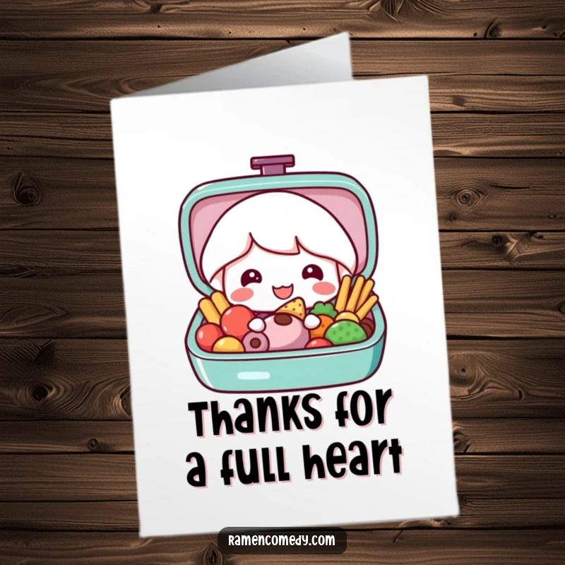 Funny Free Printable thank you card featuring a smiling bento box character opening to reveal colorful food, conveying heartfelt appreciation.