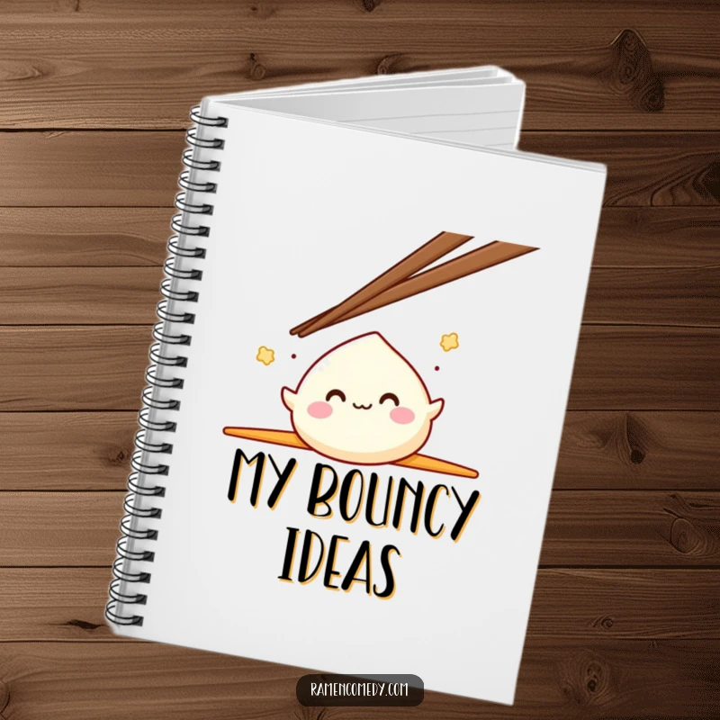 Funny Mochi Notebook featuring a smiling mochi character joyfully bouncing between two large chopsticks, perfect for note-taking.