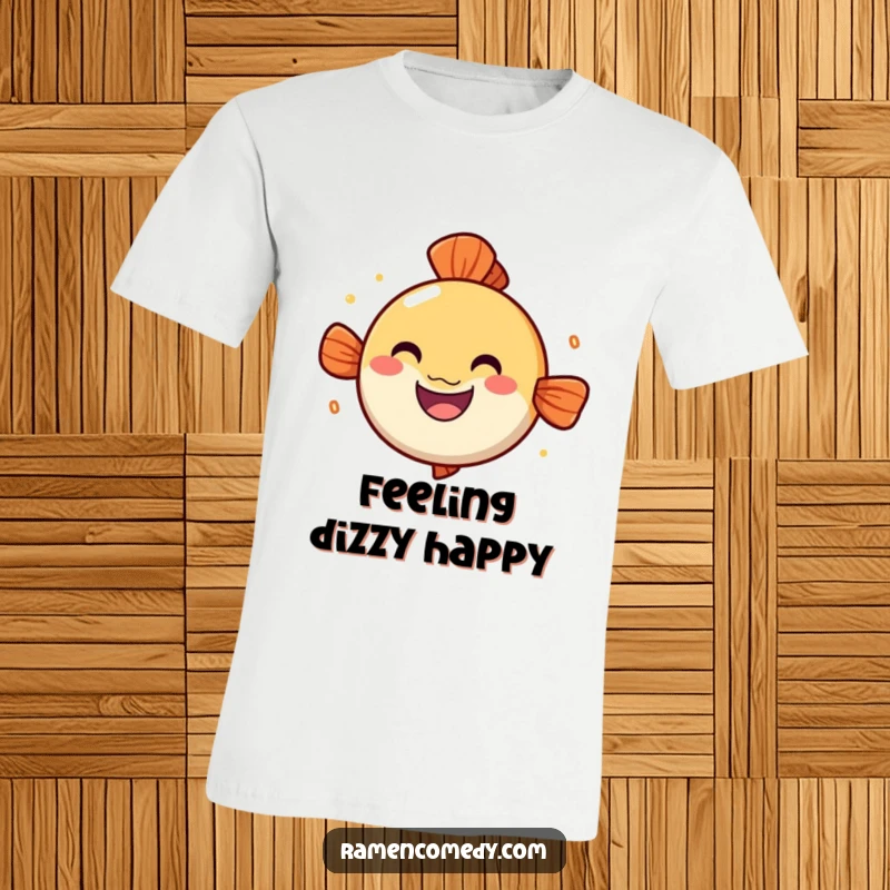 Funny narutomaki fish cake t-shirt, cheerful grin, spinning character, cute ramen apparel.